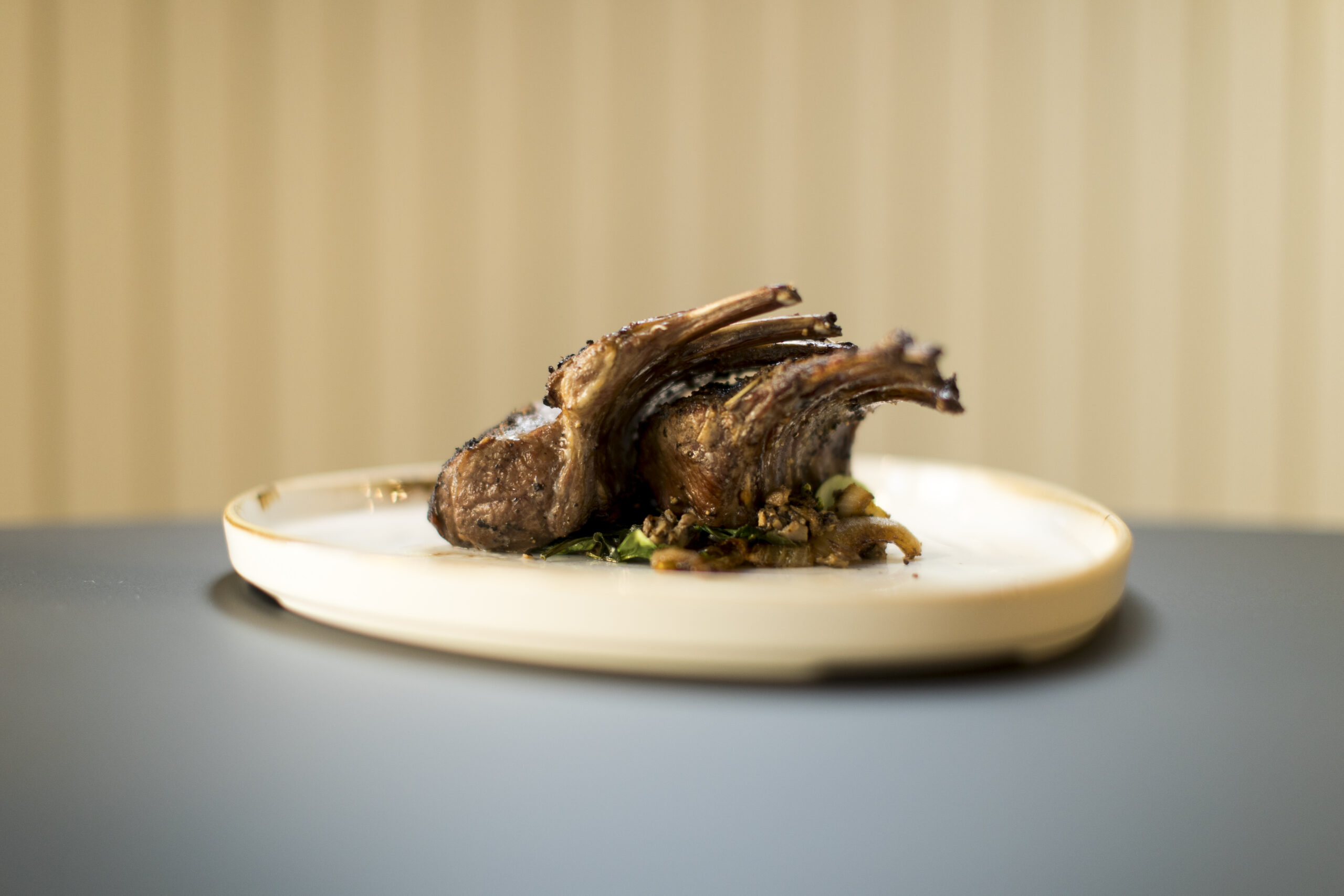 Prime Rack of Lamb in a Mushroom, Wine & Onion Sauce